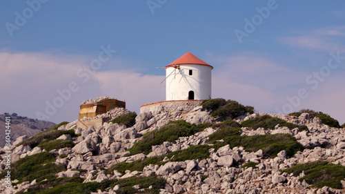 Windmill on the shore, Symi island, Panormitis, Greece © VP