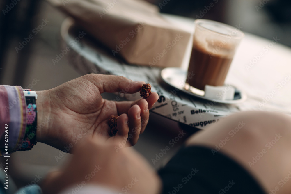 Obraz premium Baked nut dipping caramel and sesame ready to eat on hand