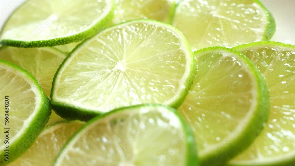green fresh rotating lime slices turning round green fresh rotating lime slices turning round