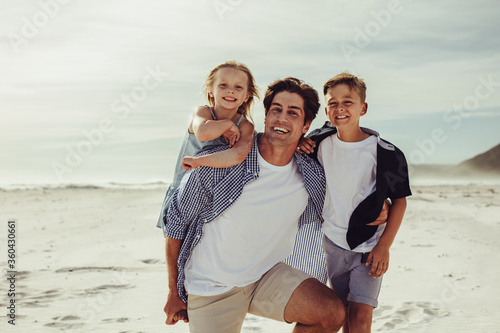 Family on summer beach vacation
