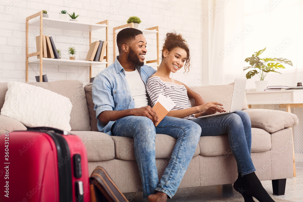 Happy Couple Using Laptop Booking Hotel For Vacation At Home Happy Couple Using Laptop Booking Hotel For Vacation At Home