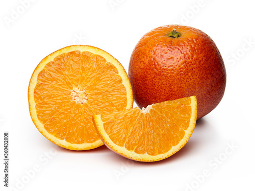 Red orange and slices of it isolated on white background.