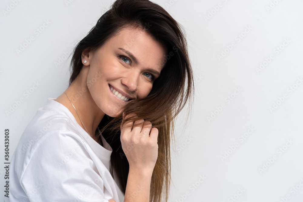 Funny woman on white background. Cheerful female model joyful. Positive human emotion facial expression body language Funny woman on white background. Cheerful female model joyful. Positive human emotion facial expression body language