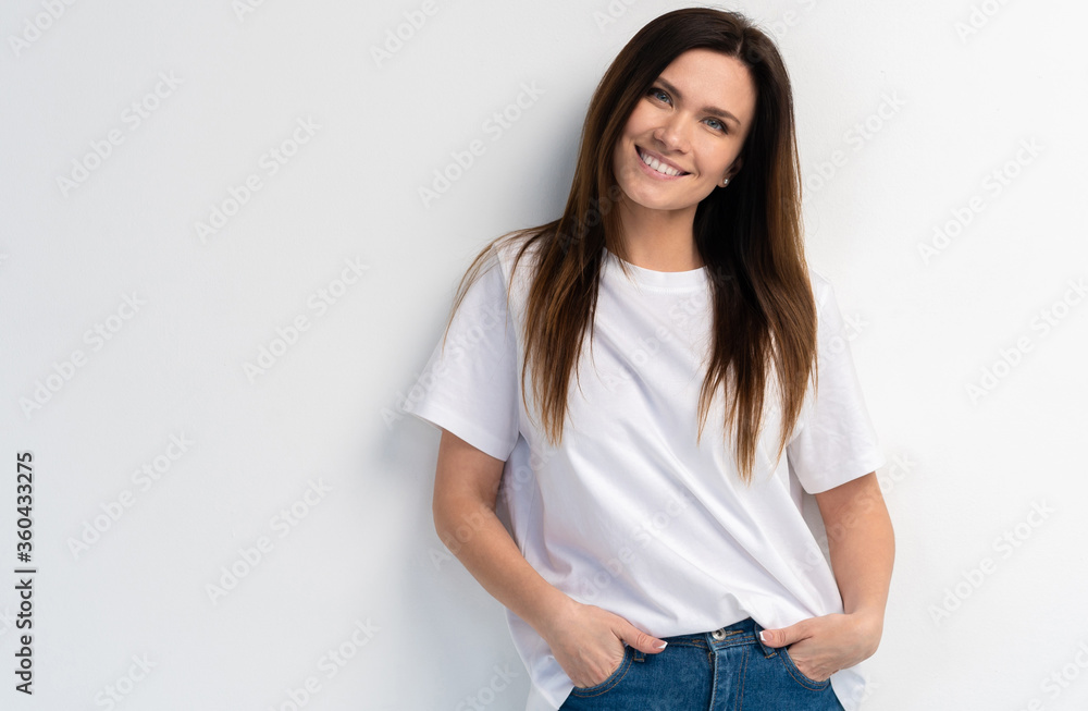 Funny woman on white background. Cheerful female model joyful. Positive human emotion facial expression body language Funny woman on white background. Cheerful female model joyful. Positive human emotion facial expression body language