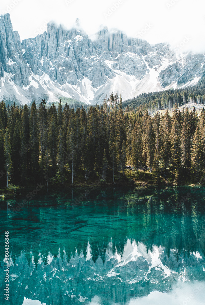 Lake at the forest with clear water and beautiful mountains