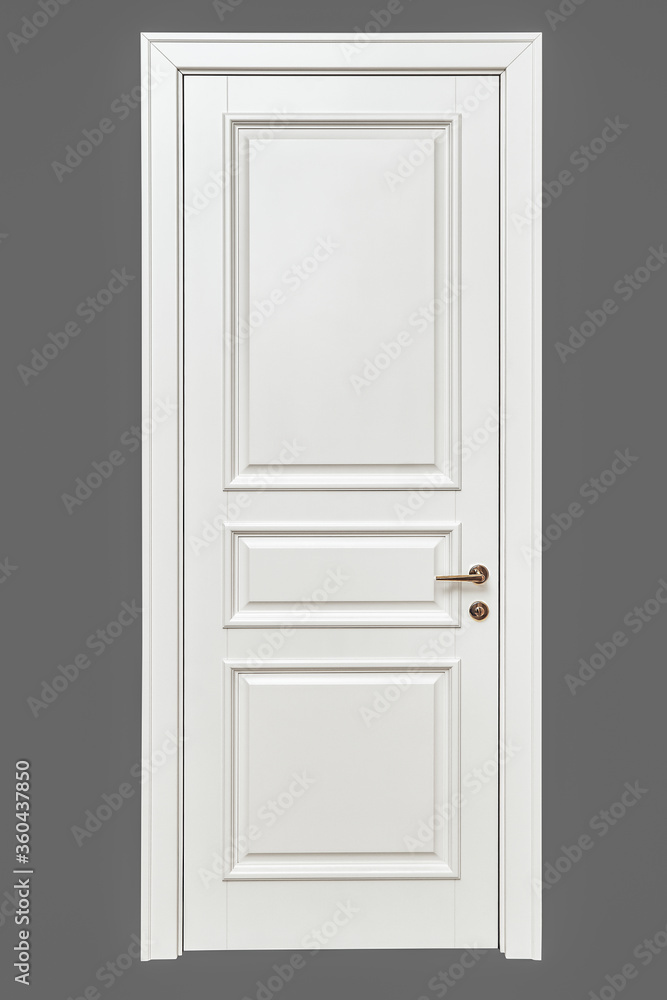 Classic style white door. White interior door isolated on gray background. Furniture manufacture. Classic style white door. White interior door isolated on gray background. Furniture manufacture.