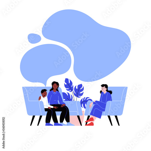A boy and his mother attending a therapy session with a female mental specialist. Family psychotherapy session. Conversation with a kids psychologist