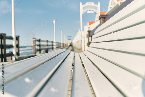 White bench on the boardwalk. Baltic Sea. The beach of Zelenogradsk. Kaliningrad region. High quality photo