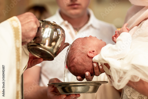 Canvas Print Baptism ceremony in Church. baptism holy water Catholic