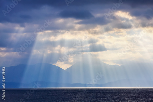 Sunrays. Beautiful summertime view seascape. 2020 summer travel. Widescreen frame backdrop. Romantic relax places. Location place island Crete  Greece