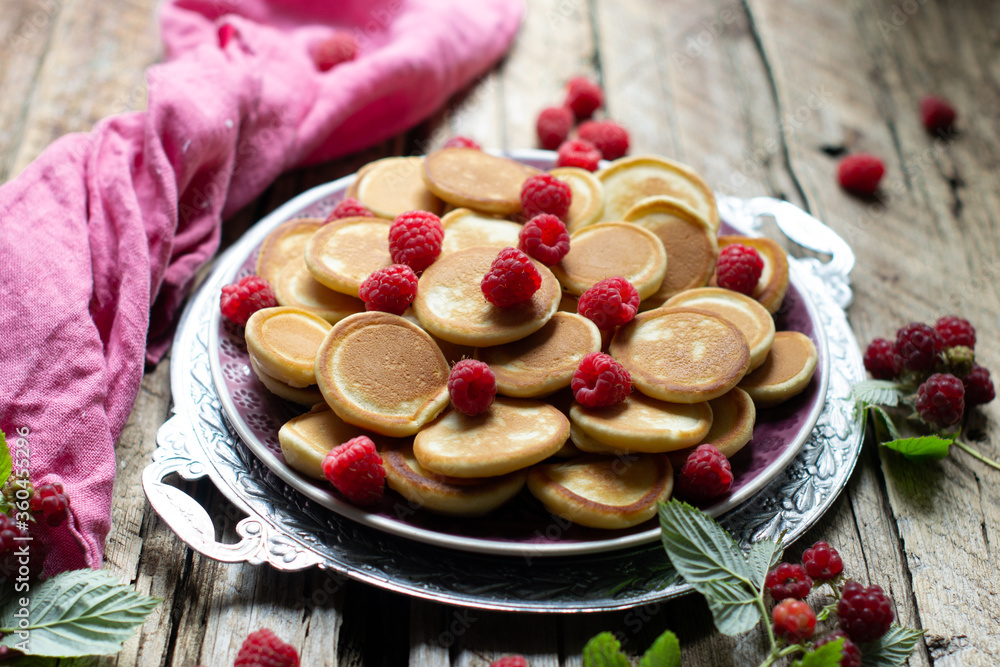 mini pancakes with fruits on a plate mini pancakes with fruits on a plate