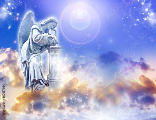 angel archangel over divine sky with rays of light, flare, stars in blue yellow colors like spiritual religious and mystic and guardian angel concept  with copy space