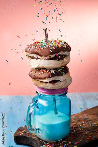 chocolate donuts with colorful sprinkles