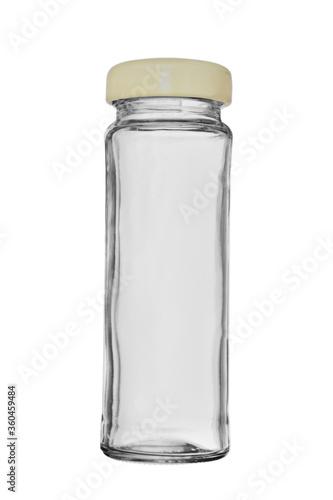 Empty narrow glass bottle with a lid. Isolated on a white background