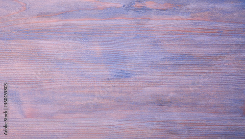 Wood texture background in purple color. wood board, copy space very peri color