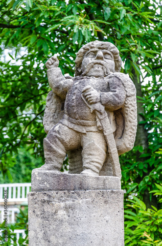 Statue of a male dwarf (carved by workshop of baroque sculptor Matthias Bernard Braun) in the park of the castle, Nove Mesto nad Metuji, Czech republic © DrObjektiff