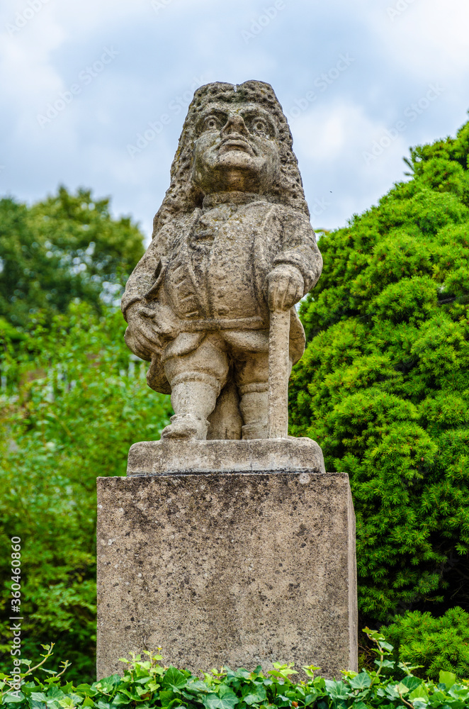 Statue of a male dwarf (carved by workshop of baroque sculptor Matthias Bernard Braun) in the park of the castle, Nove Mesto nad Metuji, Czech republic