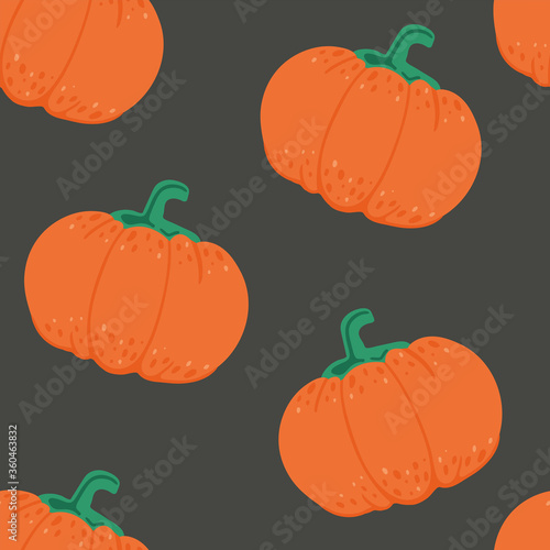 Pumpkin seamless pattern. Orange pampkin isolated on dark. Autumn harvest. For halloween and thanksgiving day design. Vector doodle cartoon background photo