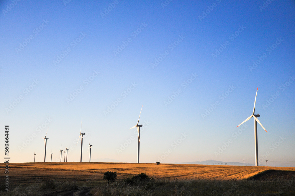 Wind turbines on wheat planting area Wind turbines on wheat planting area