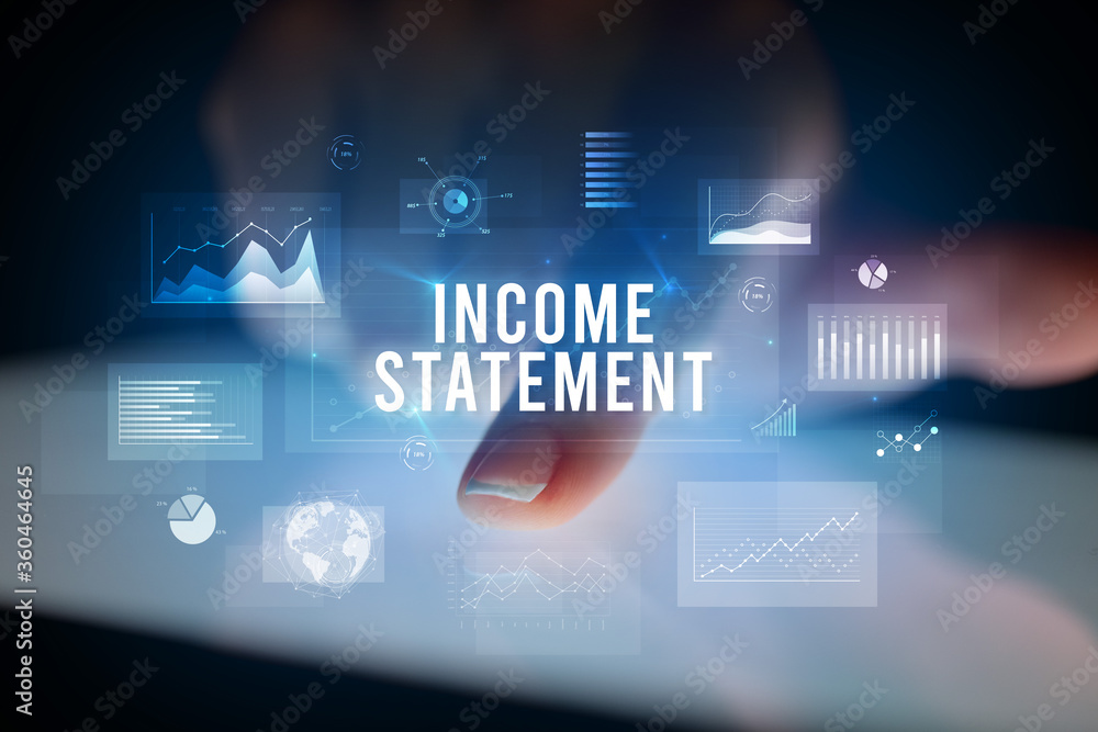 Finger touching tablet with charts and INCOME STATEMENT inscription, business concept Finger touching tablet with charts and INCOME STATEMENT inscription, business concept