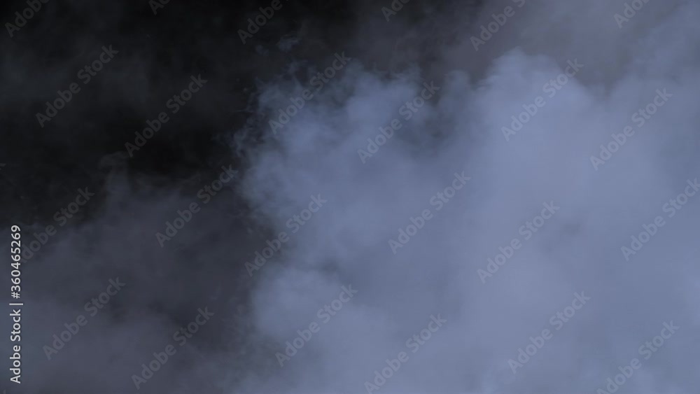 Abstract smoke cloud. Smoke in slow motion on black background. Abstract smoke cloud. Smoke in slow motion on black background.