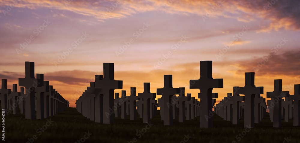 Old graveyard tombstones at evening sunset.