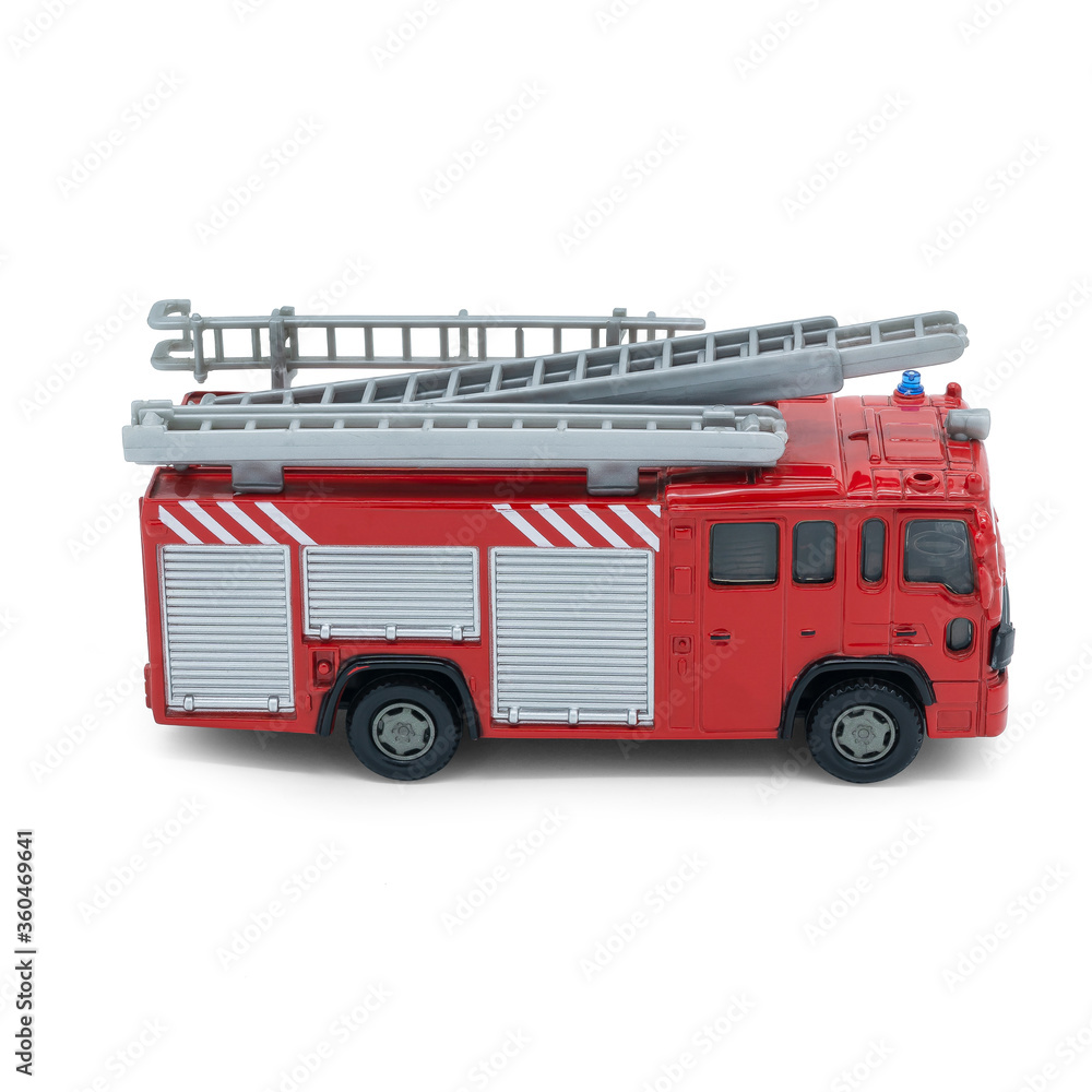 Children's toy red fire truck on a white background Children's toy red fire truck on a white background