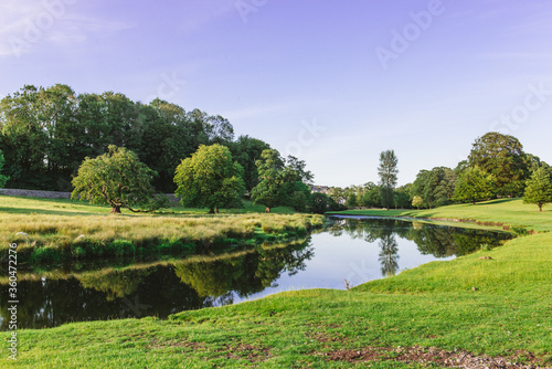 Fototapeta Naklejka Na Ścianę i Meble -  a bend in the River Bela at Dallam Park, Milnthorpe, Cumbria, England
