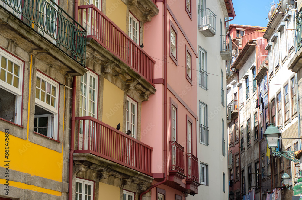 Fototapeta premium Historic old city buildings facades and with clean laundry on balconies, Porto, Portugal