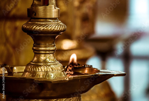 Burning candle in indian temple