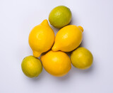Close up of citrus fruits lemon and lime isolated on white background.