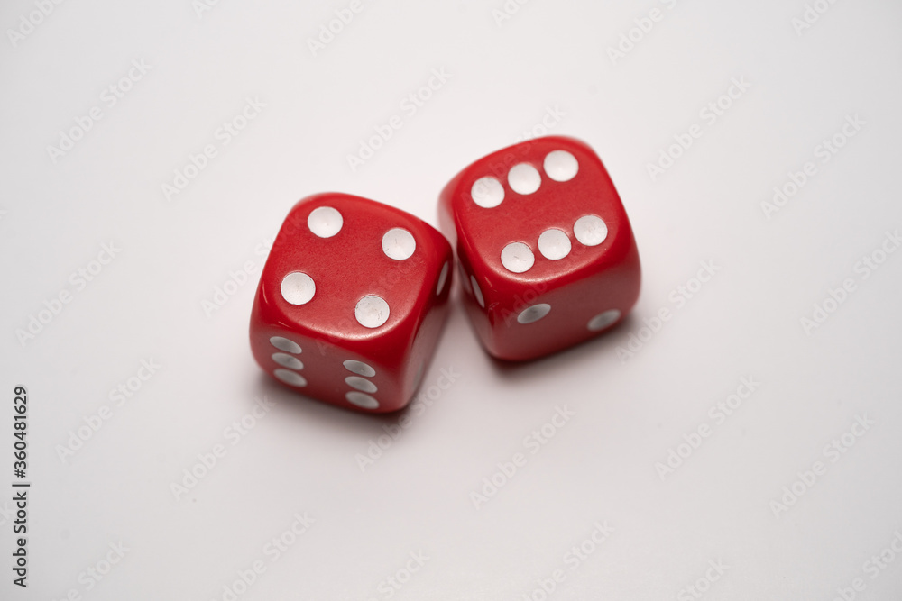 red dice on a white background from above