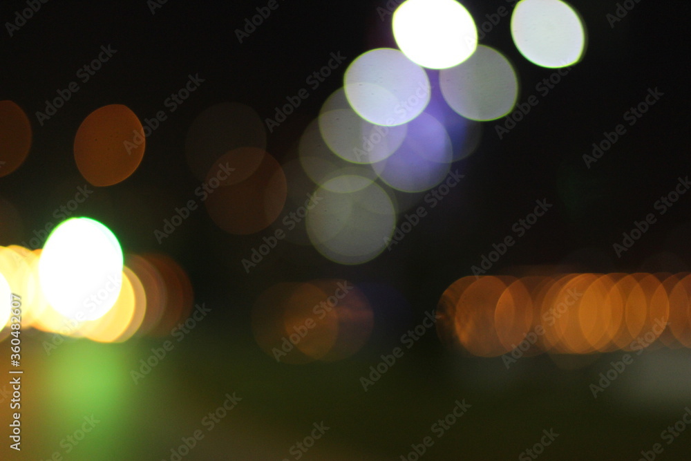 Fototapeta premium City light. A background for designers. Bokeh light. Colored light.