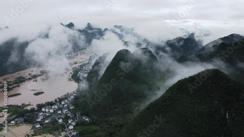 Flooding in China mountain landscape, Yulong and Li River disaster, Guangxi aerial