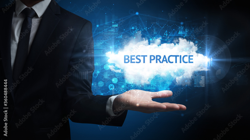 Hand of Businessman holding BEST PRACTICE inscription, successful business concept Hand of Businessman holding BEST PRACTICE inscription, successful business concept