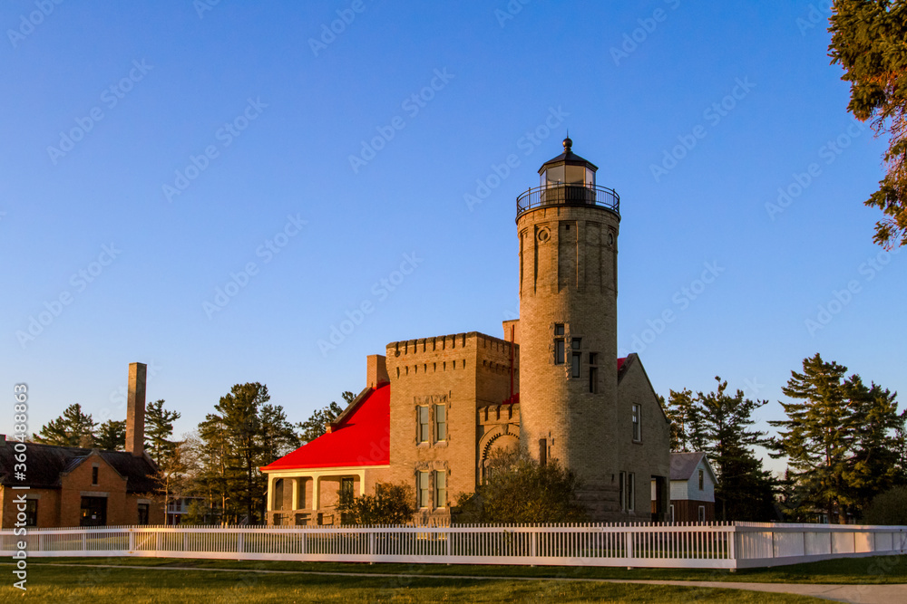 Mackinaw Point Lighthouse. Exterior of the historical Old Mackinac Point Lighthouse in Michigan. The lighthouse is a state owned historical structure and not a private property or residence. 