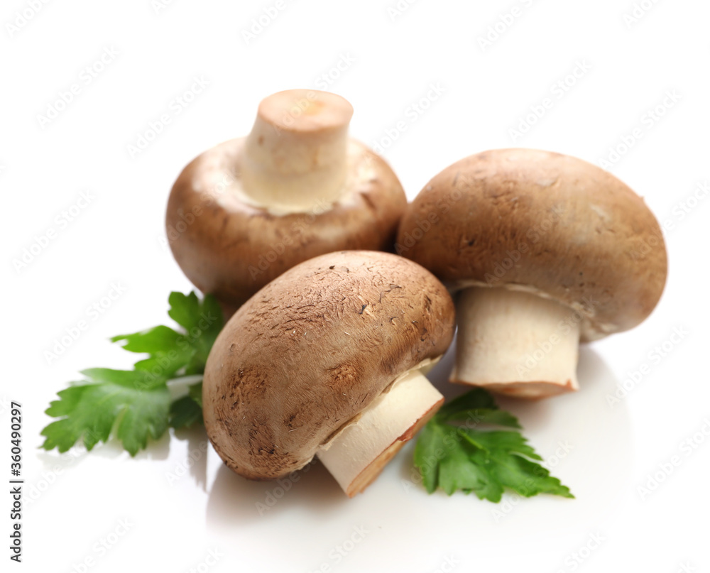 Brown champignons isolated on white background Brown champignons isolated on white background