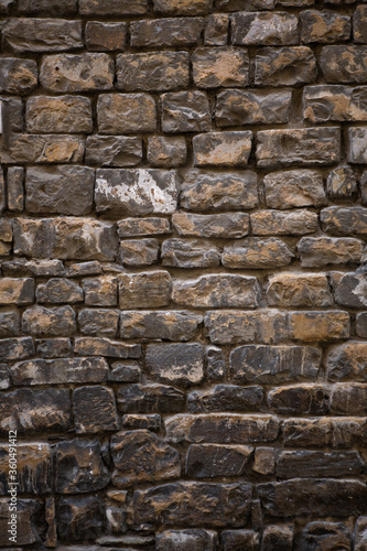 Old brickwork pattern. Brick stone wall or surface of building. Retro concept. Grunge concept. Abstract wallpaper, texture or background.