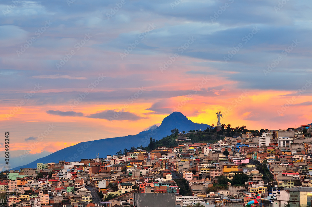 View of the city of Quito with the Panecillo at sunset