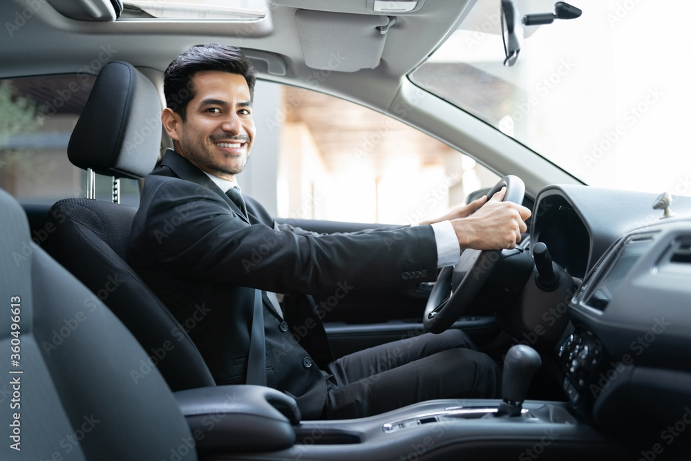 Confident Latin Businessman Driving Car Confident Latin Businessman Driving Car