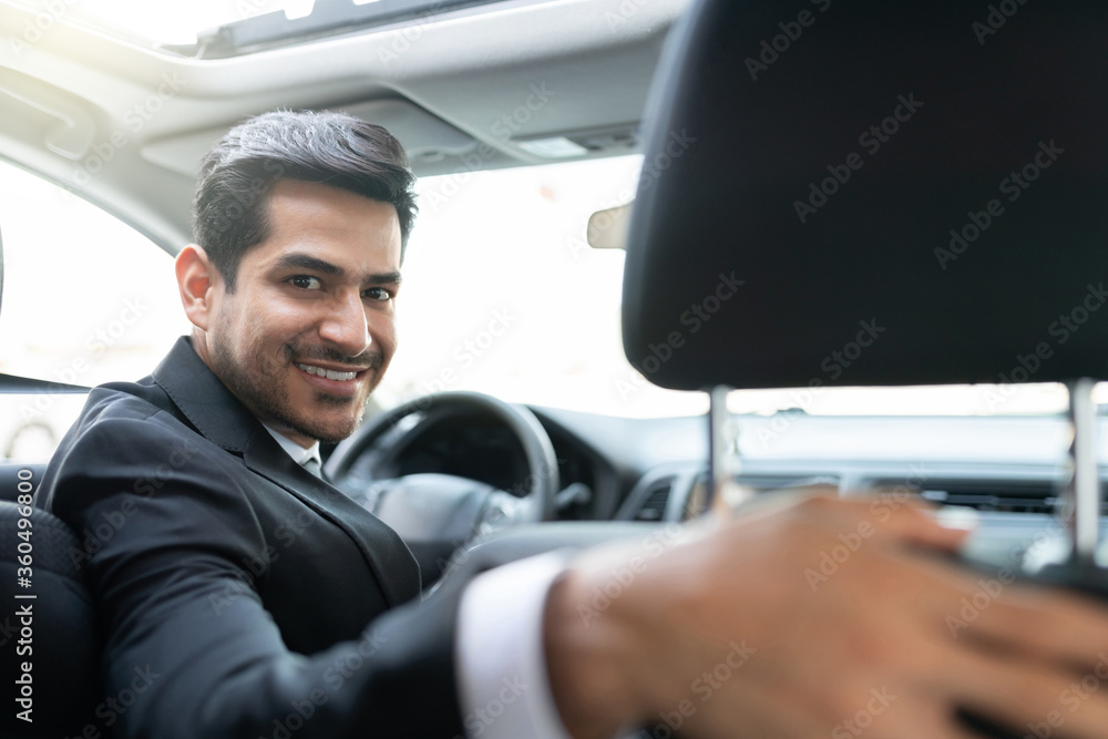 Confident Business Executive In Car