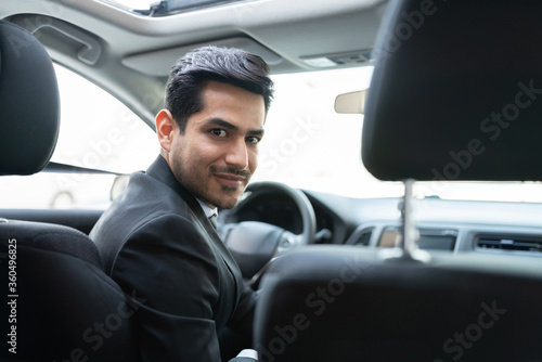Confident Business Executive In Car