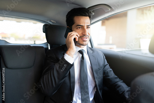 Businessman Talking On Mobile Phone In Car © AntonioDiaz