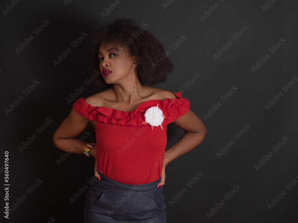Sensual African American woman wearing a red summer top Sensual African American woman wearing a red summer top