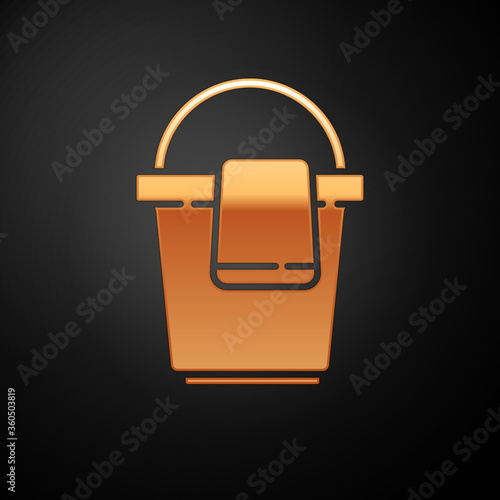 Gold Bucket with rag icon isolated on black background. Cleaning service concept. Vector Illustration.
