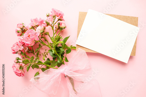 layout postcard for congratulations and invitations.  bouquet of pink roses with blank card © Palanga