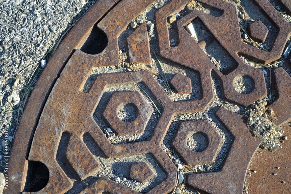A Rusted Storm Drain Lid