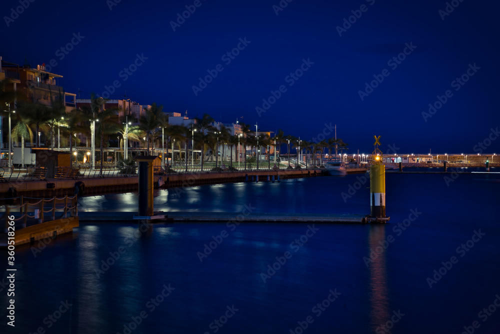 Maritime promenade at night. Gandia.
