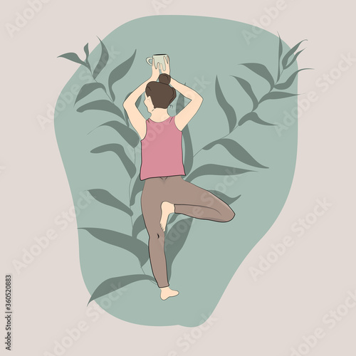 Yong woman doing yoga in the morning. Tree pose in yoga.