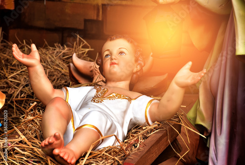 Fotografie Statuettes of baby Jesus,The birthday of Jesus is a statuette of Maria with Joseph and newborn Jesus on the hay, A Christmas nativity scene
